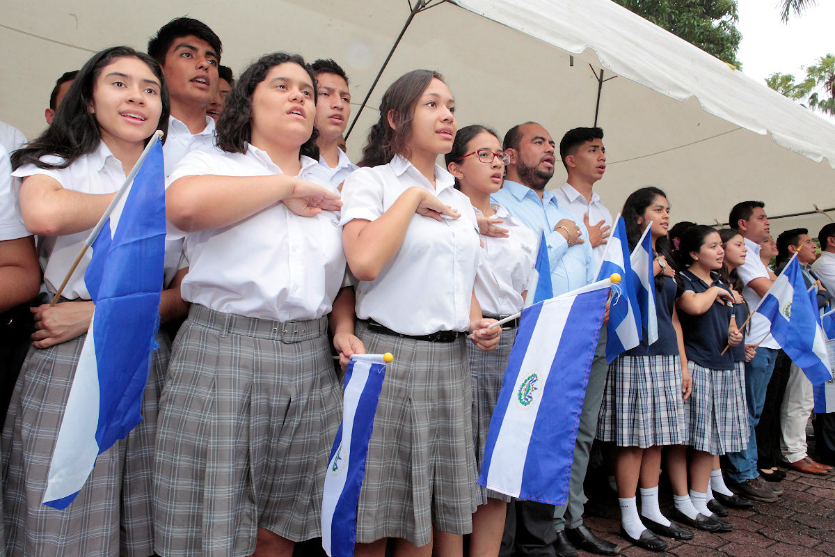 Students singing the National Anthem of El Salvador.